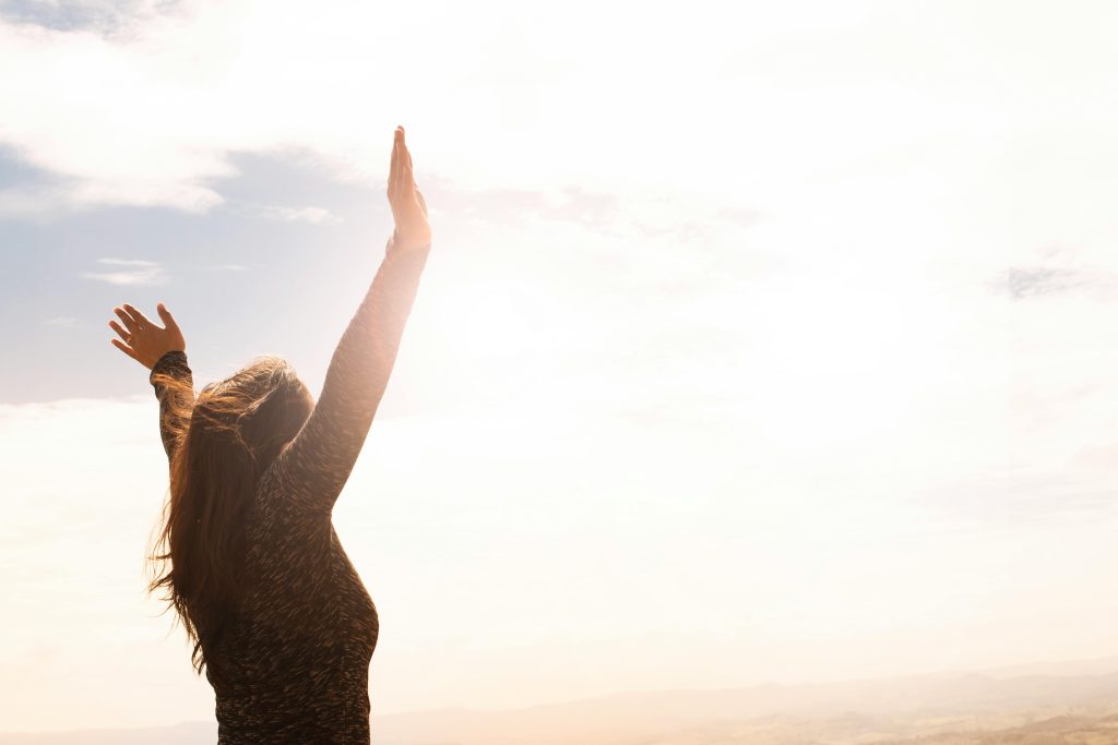 pexels-photo-1556691-1556691 Photo of Woman Raising Both Hands